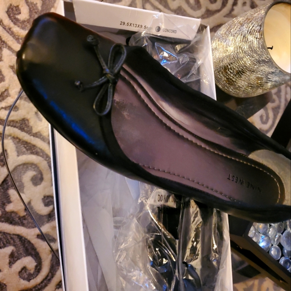 Size 11 never worn leather ballerina-style shoes.